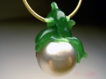 18mm South sea pearl and dolphins representing family members.